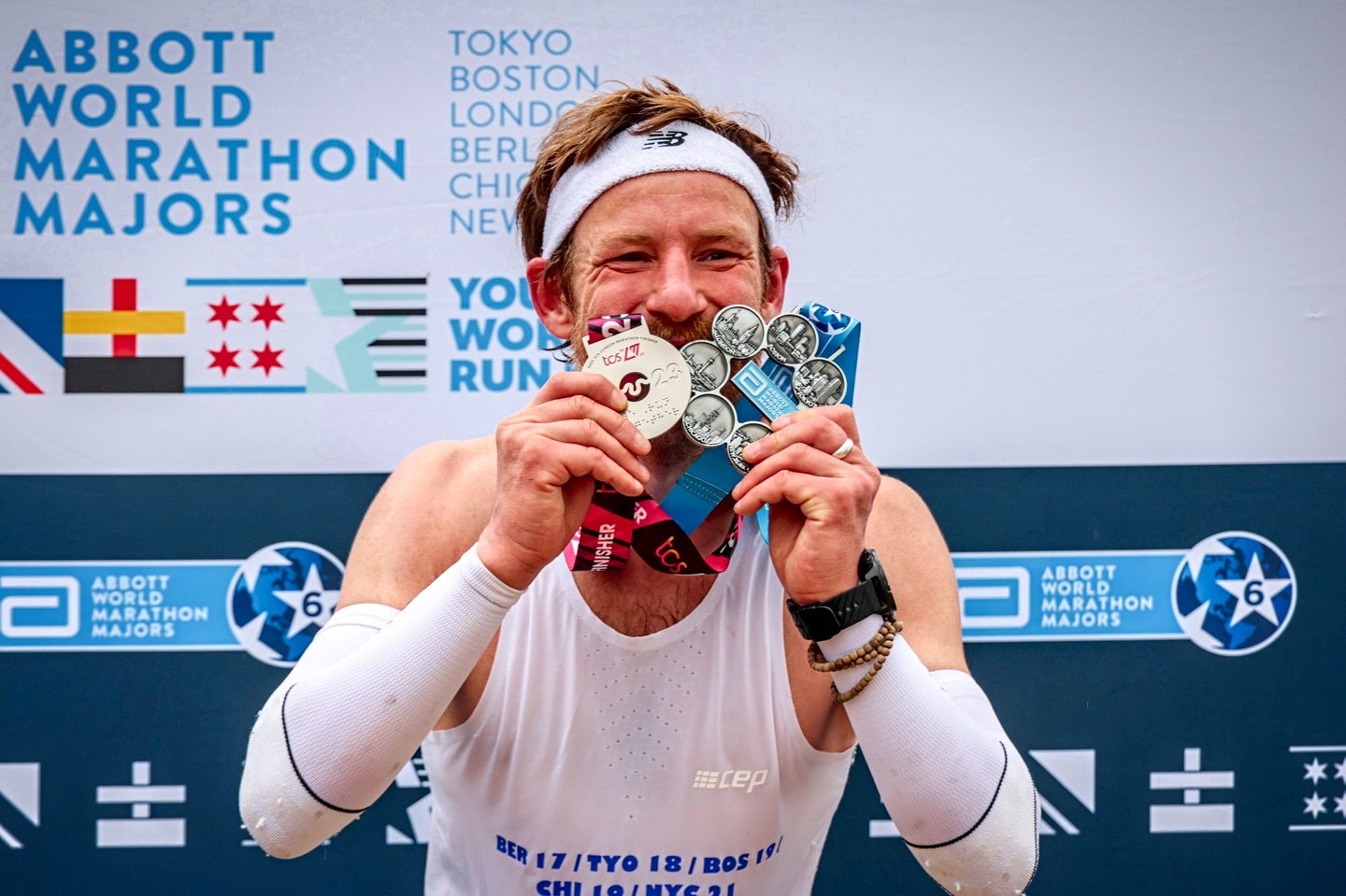 Игорь Лисник с медалью Abbott World Marathon Majors Six Star Finisher 